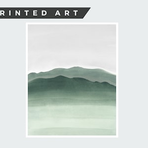 May include: Abstract watercolor painting of a green mountain range with a light gray background.