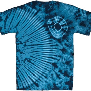 May include: A blue tie-dye t-shirt with a circular pattern on the right side and a radial pattern on the left side.