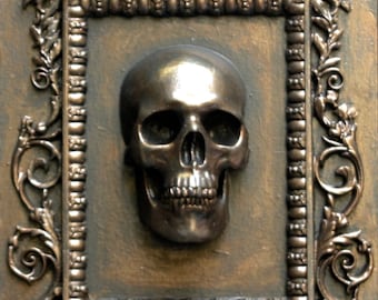 Head of death. Wall plate. bronze finish.