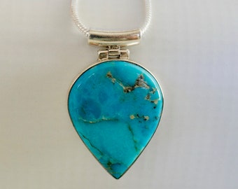 Magnificent, Genuine Sleeping Beauty Turquoise Pendant Set In Sterling Silver With Sterling Silver Chain.