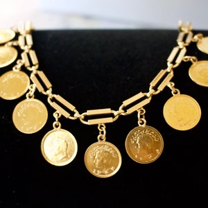 A Magnificent Solid 18k Yellow Gold Chain with 10 1/4 Pahlavi Gold Coin Bracelet. Size 6.75 inches.