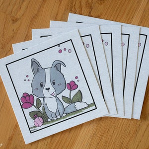 Kaart schattige Border collie met bloemen getekend