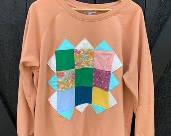 Sudadera de cuello redondo con parche de colcha vintage