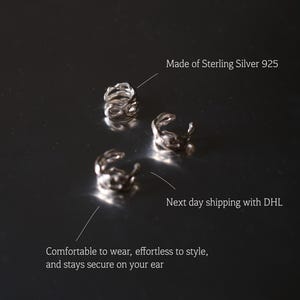 Pu&ograve; includere: Polisini per orecchie in argento realizzati in argento sterling 925. I polsini per orecchie sono progettati per essere comodi da indossare e facili da acconciare. Il testo nell'immagine dice che rimangono saldi sull'orecchio.