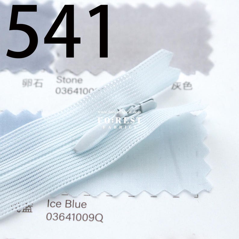 May include: A light blue zipper with a white pull tab, labeled "Ice Blue" and "03641009Q". The number "541" is printed in large black font above the zipper. A fabric swatch is visible in the background.