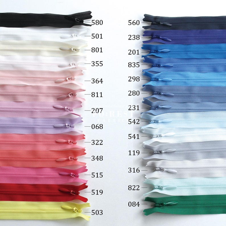 May include: A collection of colorful nylon zippers in various shades, including black, white, pink, blue, and green. Each zipper is closed and features a metal slider. The image showcases a range of colors and zipper sizes, suitable for sewing and crafting projects.