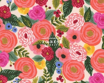 May include: A white fabric with a floral pattern featuring pink, red, and yellow flowers. The flowers are stylized and have a hand-painted look. The background is a light cream color.