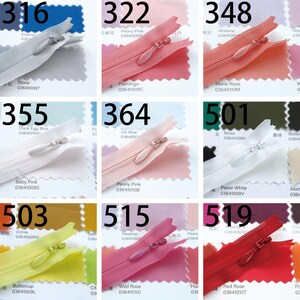 May include: A collection of nine zippers in various colors, including stone, flamingo, and red rose. Each zipper is displayed on a swatch of fabric with a corresponding color name and number. The zippers are for sewing and crafting.