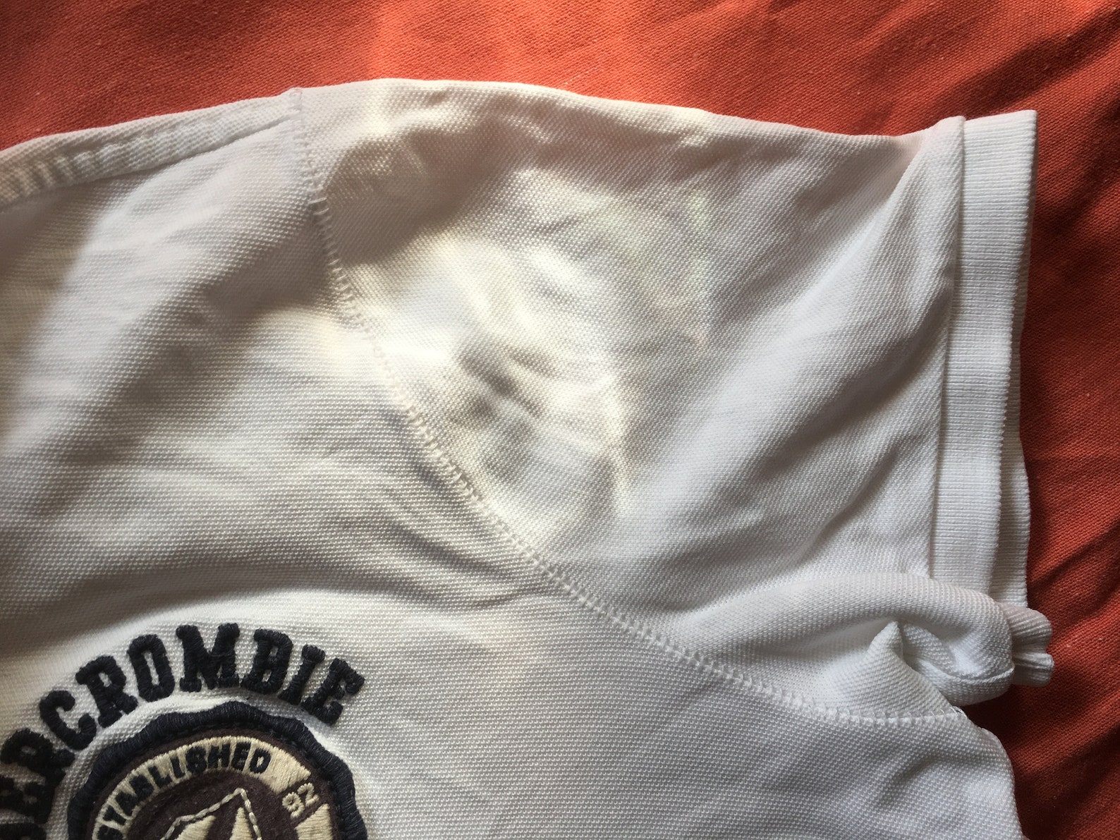 white abercrombie polo shirt
