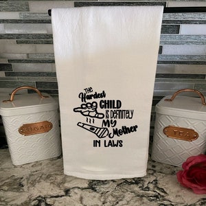 The hardest child is my mother in laws, new mom tea towel, mom kitchen towel, funny floursack towel, Mother’s Day gift, mom gift, wife gift