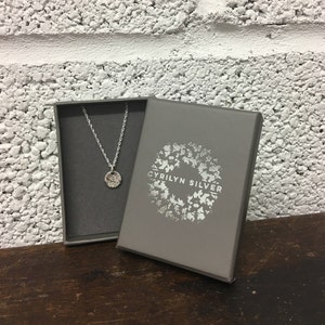 Pendente smash circle in argento sterling