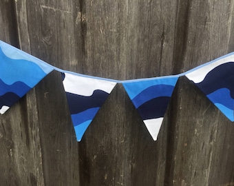 Tygbanderoll: Blå vågfestdekor