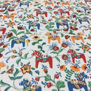 Rainbow Dala Horse Fabric: Scandinavian White Cotton, 59" Wide