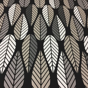 May include: Black fabric with a repeating pattern of stylized leaves in shades of gray and beige.
