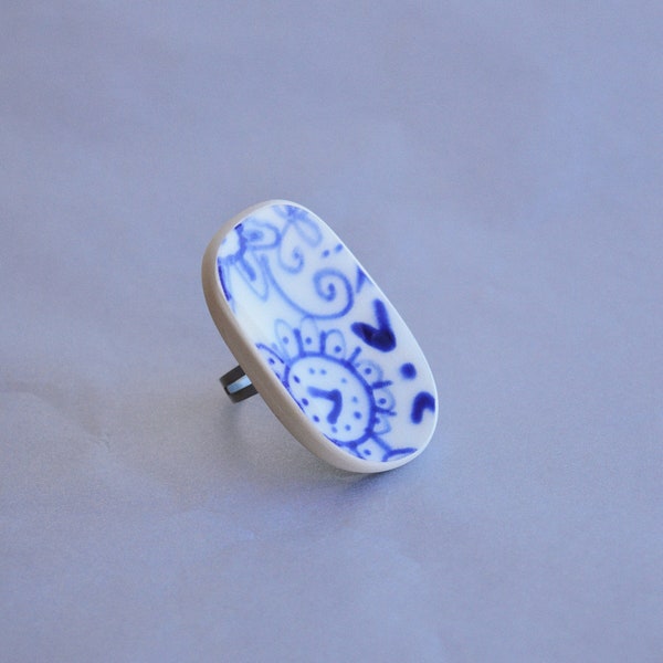 Whimsical Porcelain Ring: Playful Floral Design on Upcycled Broken Plate