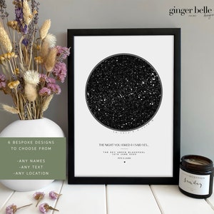 May include: A black and white star map print with the text "The night you asked & I said yes. The sky above Blackpool 12th June 2020 Pete & Laura" in a black frame.