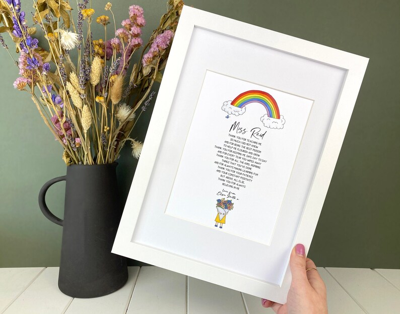 May include: A white frame with a rainbow and clouds illustration. The text in the image reads "Miss Reid" and includes a poem thanking a teacher for their hard work. The poem ends with "Love from,  [Name]"