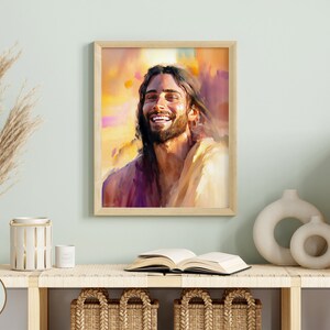 May include: A digital painting of a man with long brown hair and a beard smiling. He is wearing a white robe and the background is a watercolor wash of orange, yellow, and purple.