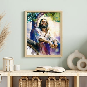 May include: A digital painting of Jesus Christ sitting on a tree branch, smiling and looking up at the sky. The painting is done in a watercolor style with bright colors and a soft, ethereal feel.