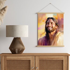 May include: A digital painting of a man with a beard and long hair smiling. He is wearing a light brown robe and the background is a warm yellow and orange.