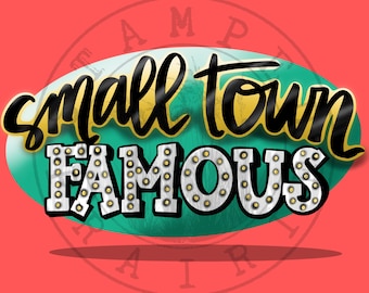 May include: A teal and gold oval sign with the text "small town famous" in black lettering. The word "famous" is in a silver, metallic font with gold light bulbs around the letters.
