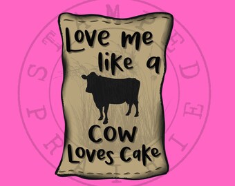 May include: A brown burlap sack with the text "Love me like a cow loves cake" printed on it. A black silhouette of a cow is in the center of the sack.