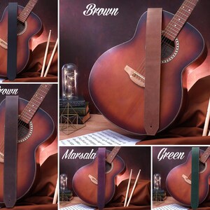 May include: A close-up of a guitar with different colored leather guitar straps. The straps are shown in black, brown, dark brown, marsala, and green.
