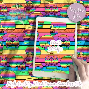 May include: A seamless digital pattern featuring colorful rainbow stripes and skulls. The pattern is 12x12 inches and 300 dpi. The text "Digital File" is in a pink rectangle in the upper right corner. The text "High Quality, Hand Drawn Seamless File" is at the bottom of the image.