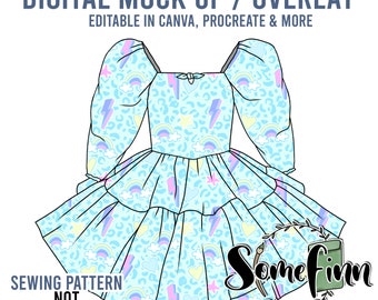 May include: A digital mock-up of a light blue dress with a rainbow, lightning bolt, and heart pattern. The dress has a square neckline, puffed sleeves, and a tiered skirt. The text "DIGITAL MOCK UP / OVERLAY" is at the top of the image. The text "EDITABLE IN CANVA, PROCREATE & MORE" is below the first line of text. The text "SEWING PATTERN NOT INCLUDED" is at the bottom left of the image. The text "Some Finn" is at the bottom right of the image. The text "Seamless Graphics, Mock Ups & Poly Mailers" is below the text "Some Finn".