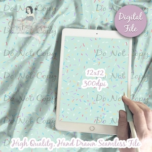 May include: A digital file of a seamless pattern with colourful sprinkles on a light blue background. The pattern is 12x12 inches and 300 dpi. The text "Do Not Copy" appears multiple times on the image.