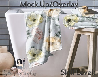 May include: A white bath towel with a floral pattern in shades of yellow, pink, and green. The towel is draped over the edge of a white bathtub and a wooden stool. The text "Easy to edit Mock Up/Overlay" is at the top of the image. The text "Skill Level: Beginner" is at the bottom of the image.