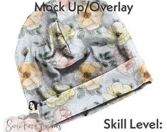 May include: A gray beanie with a floral pattern featuring yellow, pink, and green roses. The beanie is a mock-up for sublimation printing. The text "Easy to edit Mock Up/Overlay" is at the top of the image. The text "Some Finn Graphics" is at the bottom of the image. The text "Skill Level: Beginner" is at the bottom right of the image.