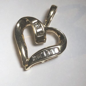 Diamond 0.10 cwt. open heart shaped 10K YG pendant