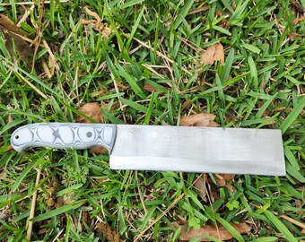 Kitchen/Camp Chopper Made From CPM154 Steel With White & Black G-10 Handle And A Lanyard Hole.  Comes With A Kydex Cover