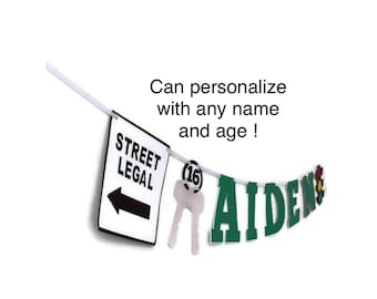 May include: A banner with the words "STREET LEGAL" and an arrow, along with the name "AIDEN" in green letters. The banner also includes a number "16" and two keys. Text on the banner says "Can personalize with any name and age!"