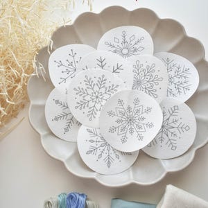 Christmas Snowflakes Embroidery Designs. Stick and stitch embroidery designs. Snowflakes pattern. Printed designs for embroidery