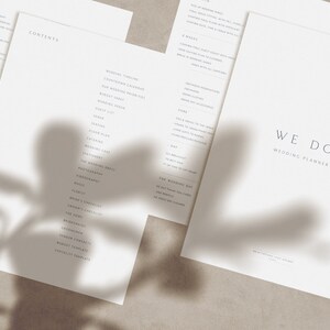 May include: A wedding planner with the title "WE DO WEDDING PLANNER" on the cover. The planner includes a checklist of tasks to complete for a wedding, including a wedding timeline, budget, guest list, and more.