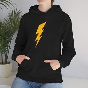 May include: Black hoodie with a yellow lightning bolt graphic on the front.