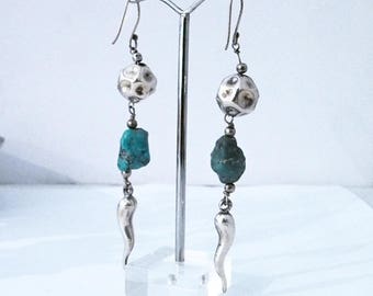 Silver earrings and turquoise stones