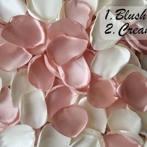 May include: A pile of blush and cream satin rose petals. 1. Blush 2. Cream