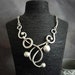see more listings in the silver plated necklaces section