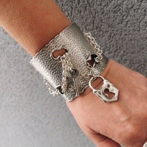 Wide Textured Silver Plated Bracelet  Keyhole Lock and Key Charm Hammered Adjustable Open Cuff Statement Jewelry