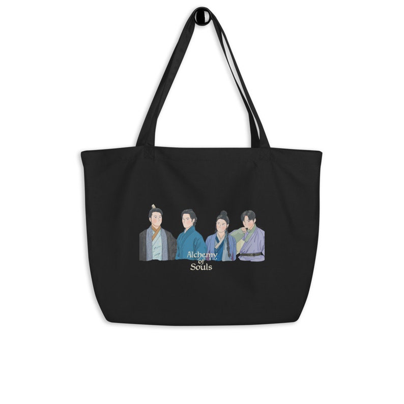 May include: Black tote bag with a graphic of four people in traditional Korean clothing. The text "Alchemy of Souls" is printed below the graphic.