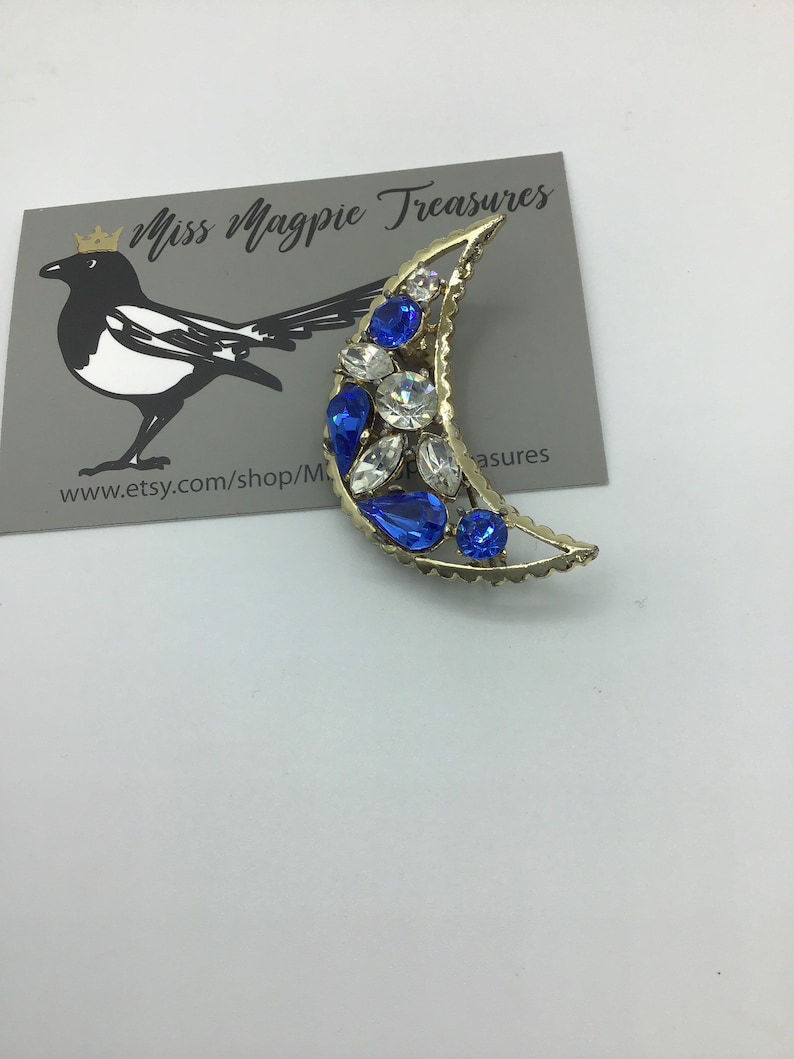 1950\u2019s vintage Crescent moon brooch with Sapphire glass crystal detail