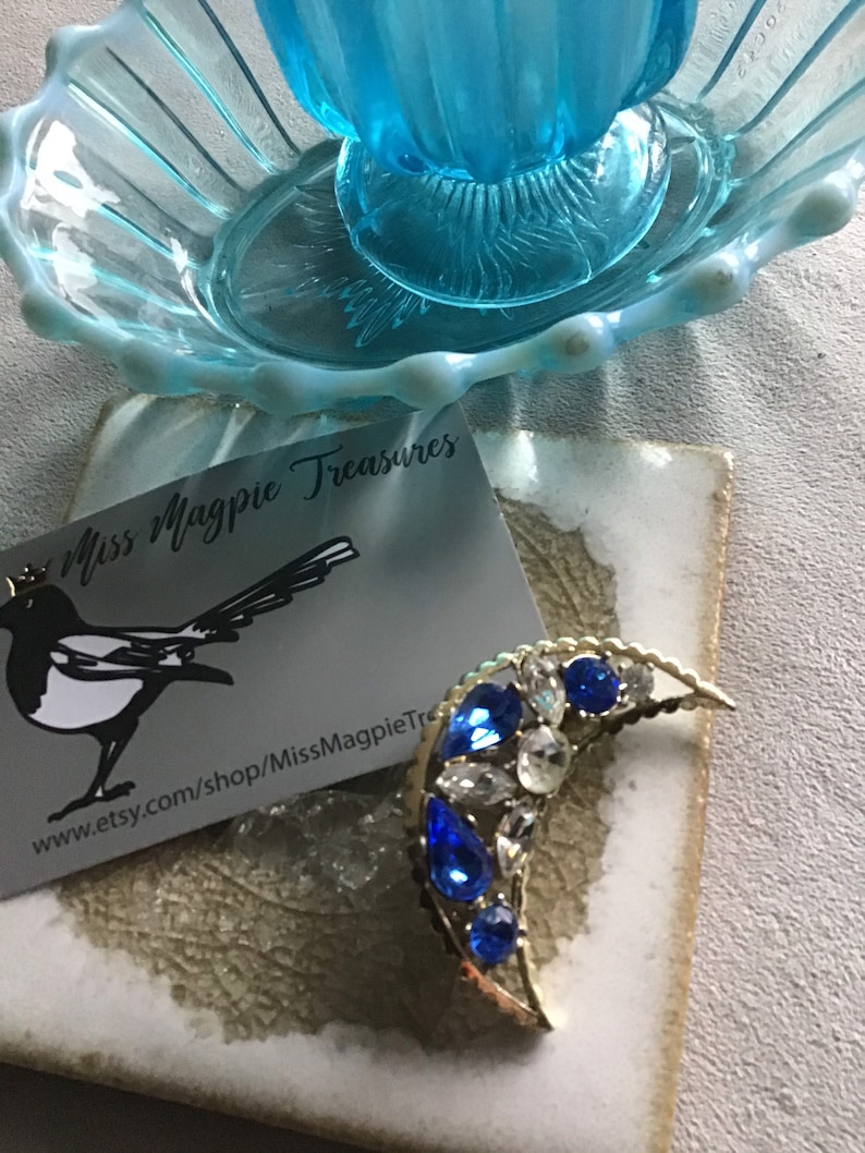 1950\u2019s vintage Crescent moon brooch with Sapphire glass crystal detail