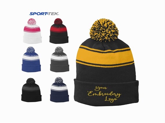 sport tek stripe pom pom beanie