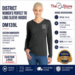 May include: A dark gray long-sleeve hoodie with a split V-neck, featuring the text YOUR LOGO HERE on the chest. The image includes product specifications such as style DM139L, 4.5-ounce tri-blend material, and a 100% satisfaction guaranteed badge.