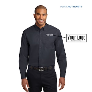 May include: A dark blue long-sleeve button-down shirt with a pocket on the left chest. The shirt has "Your Logo" embroidered on the pocket.
