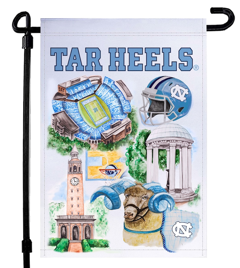 May include: A white garden flag with a blue and white design featuring the words "TAR HEELS" and images of a football helmet, a stadium, a building, a clock tower, a basketball hoop, a ram, and a logo.