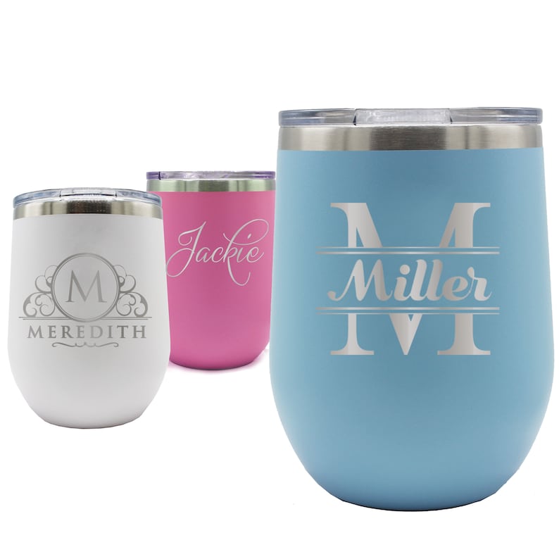 May include: Three insulated stemless wine tumblers in white, pink, and light blue. The white tumbler has a monogram with the name "Meredith". The pink tumbler has the name "Jackie". The light blue tumbler has the name "Miller". All tumblers have silver lids.